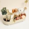 0d6f3bf9-5364-43f1-917b-594c02db8a69.jpg The Kindra Rotating Vanity Organizer