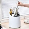 76065d44-e4b1-4537-aefc-11ffae368620.jpg The Kindra Rotating Utensil Drying Caddy