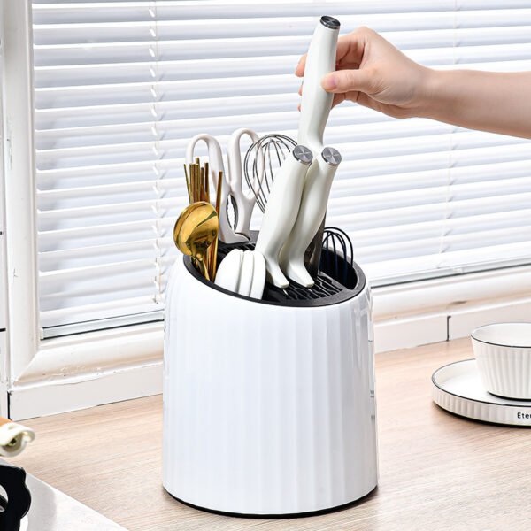 76065d44-e4b1-4537-aefc-11ffae368620.jpg The Kindra Rotating Utensil Drying Caddy